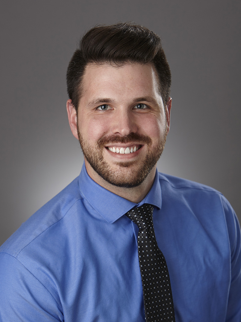 Portrait of Austin Heneman, PA-C, pain management provider at Twin Cities Pain Clinic in Maple Grove, MN