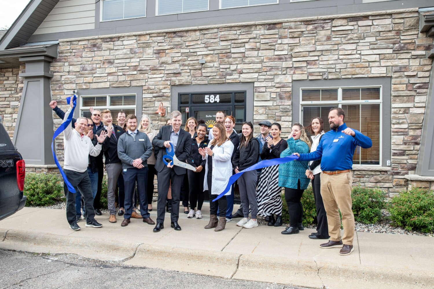 Pain clinic team and chamber representatives at the ribbon cutting at Twin Cities Pain Clinic in Chaska, MN