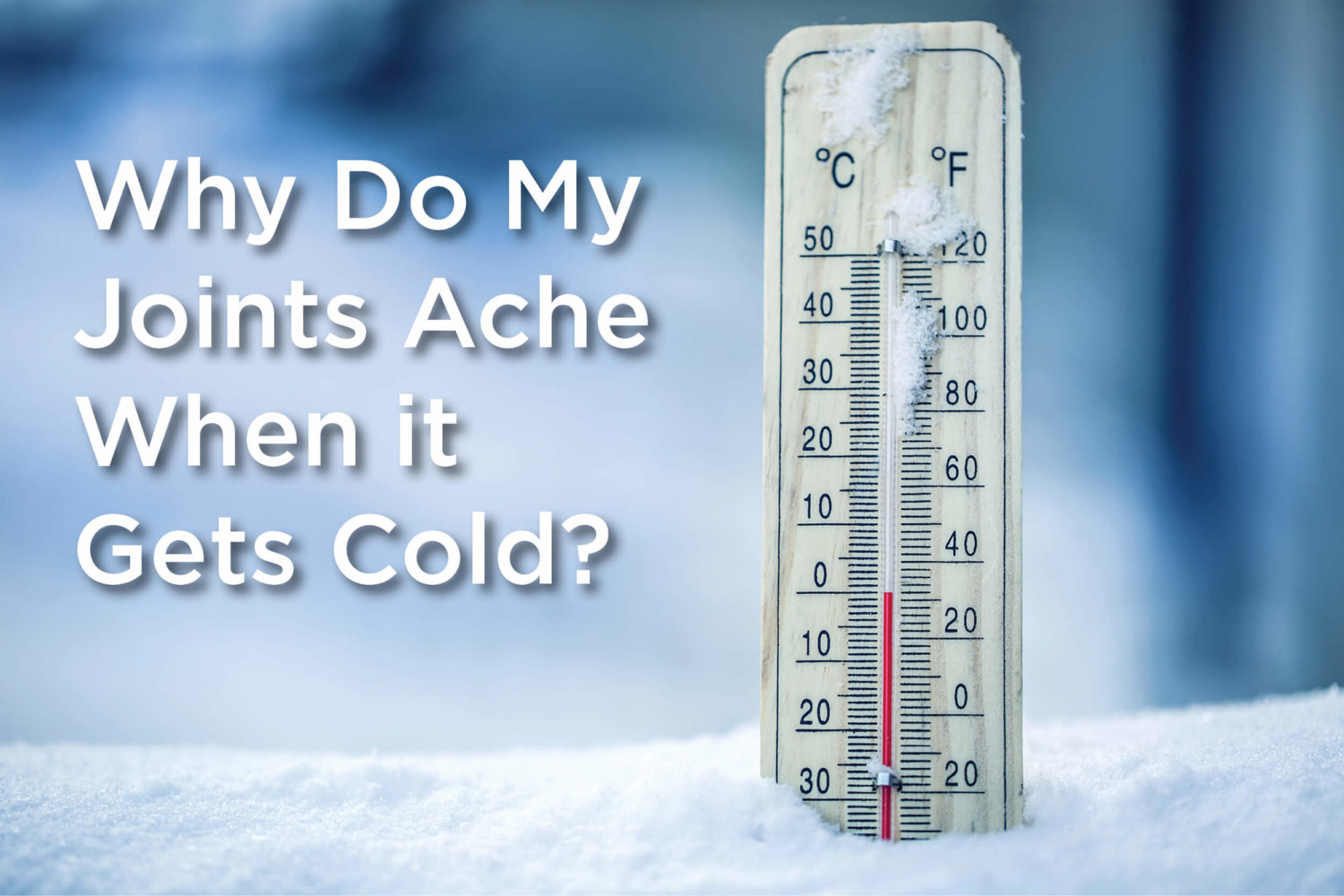 Blog title banner-Why Do My Joints Ache When It Gets Cold next to thermometer half buried in snow