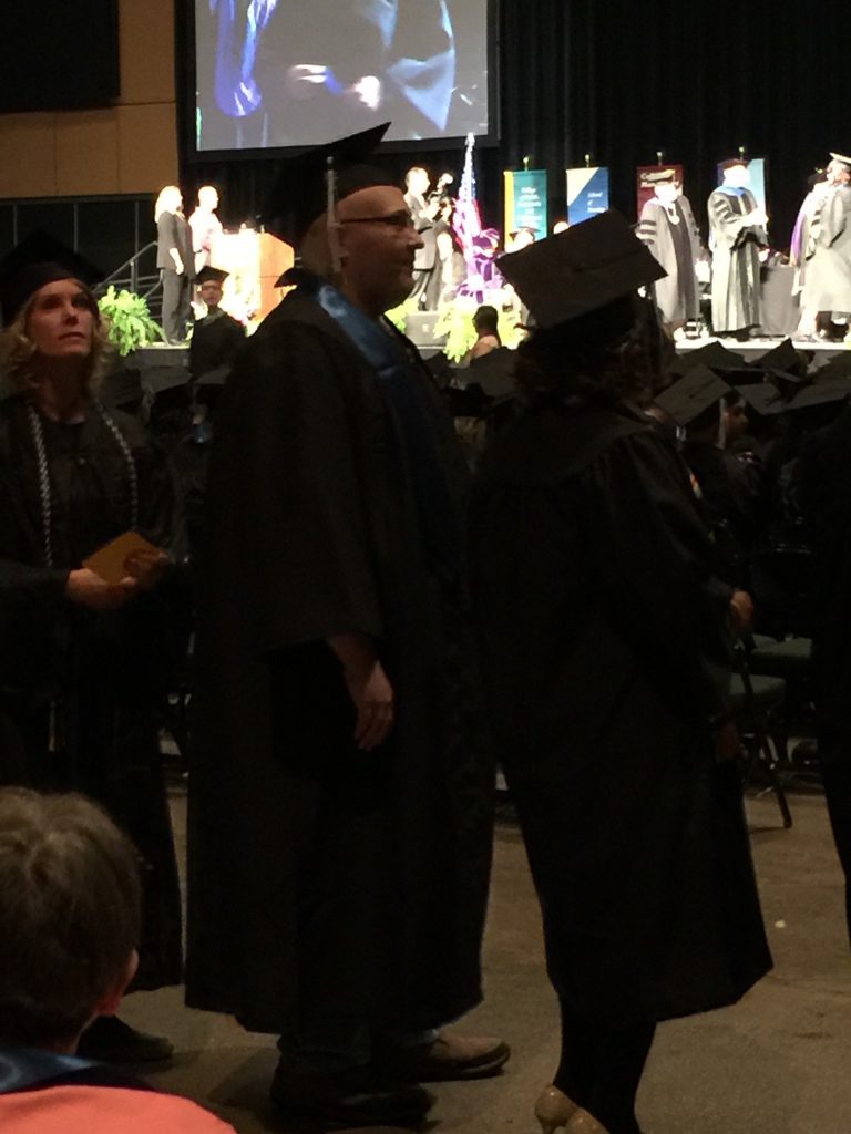 Frank graduating with his psychology degree