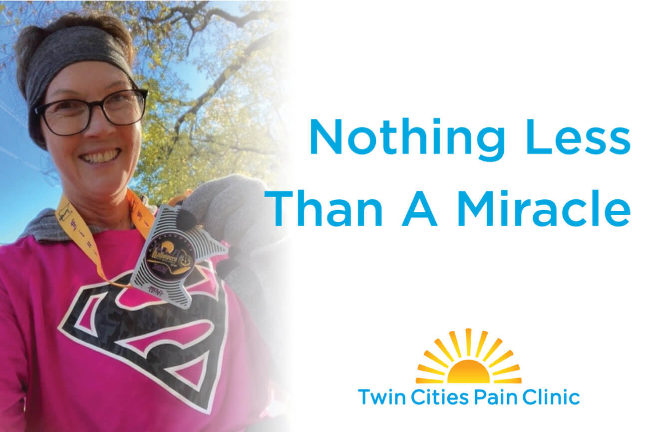 Blog banner image - Nothing Less Than a Miracle - Radiofrequency Ablation Patient Lisa Brecht holding a medal for finishing a race