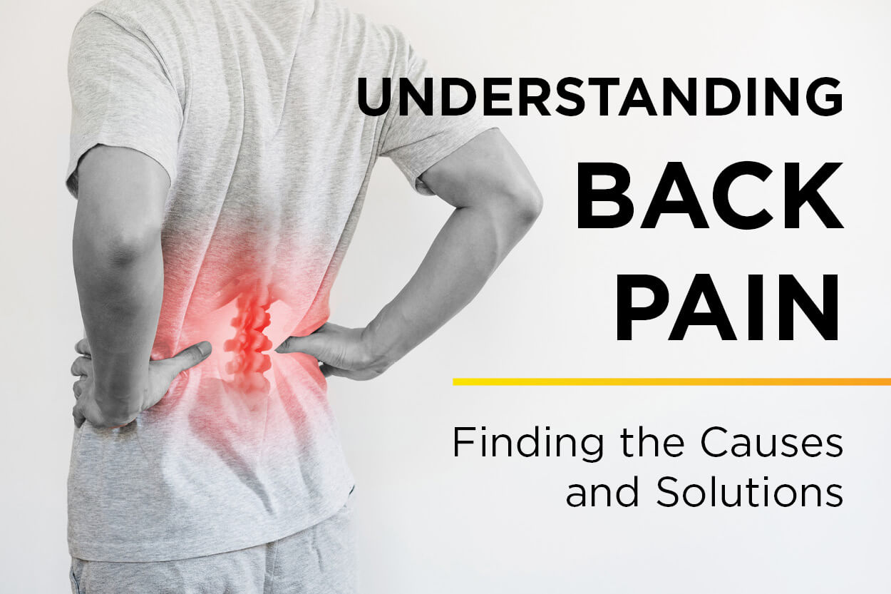 Blog title-Understanding Back Pain over black and white image of man holding lower back which is glowing red to indicate pain